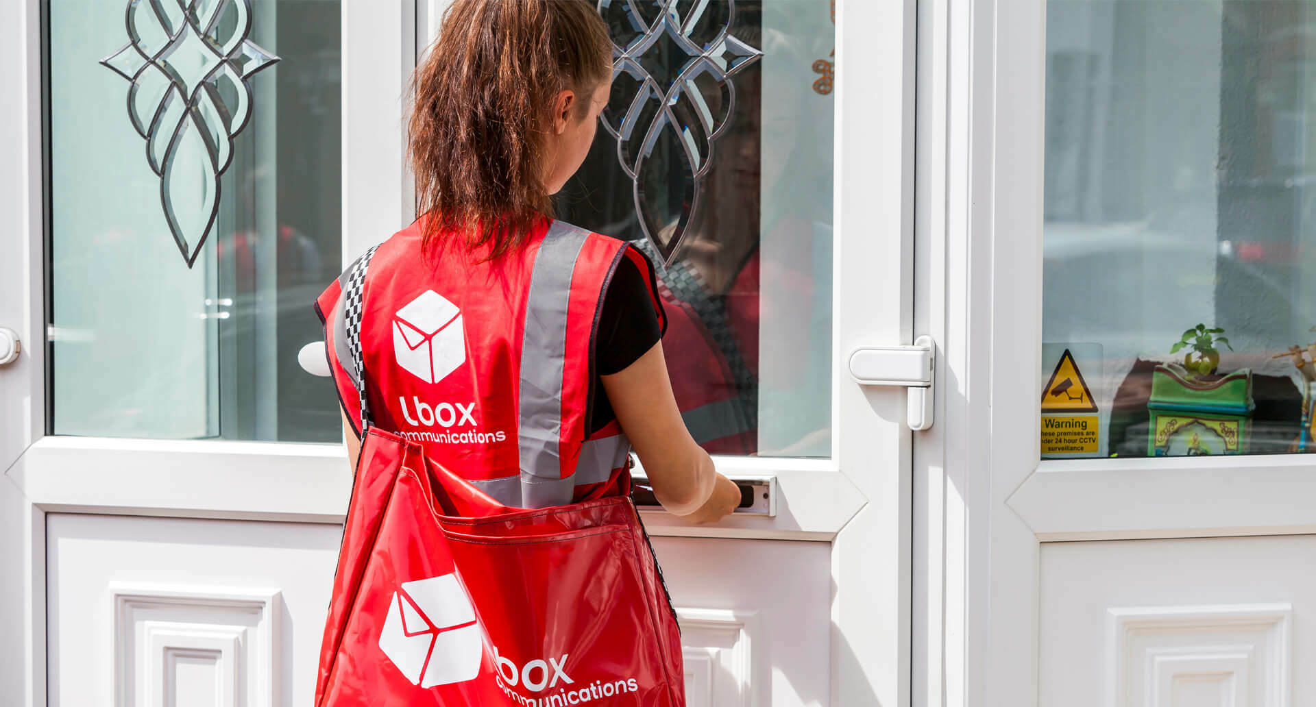 Lbox Communications delivery person